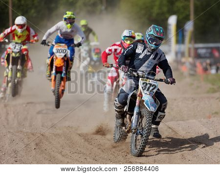 ST. PETERSBURG, RUSSIA - SEPTEMBER 2, 2018: Athletes compete in third stage of Russian Supercross Championship. This stage is held on the motor racing track of DOSAAF in Saint Petersburg