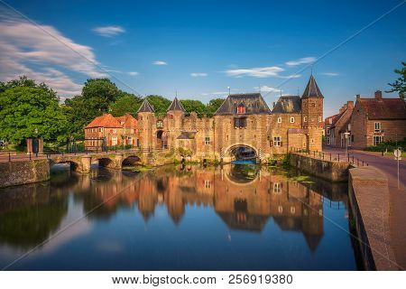 Medieval Town Wall And Gate Named Koppelpoort And The Eem River In The Historical Center Of Amersfoo