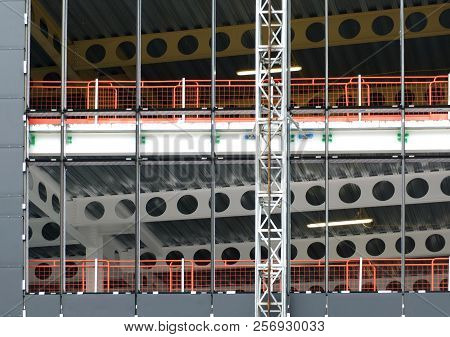 Close Up Detail Of The Construction Site Of A Metal Framed Large Building Development With A Hoist R