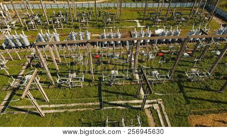 Aerial View Power Plant, Transformation Station, Cables And Wires. High Voltage Electric Power Subst