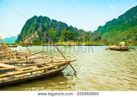 Van Long Nature Reserve With Boats And Beautiful Mountains, Ninhbinh In Vietnam