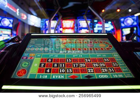 Digital Modern Roulette Table. The New Gambling Table Offers Personal Monitors And One Big Computer 