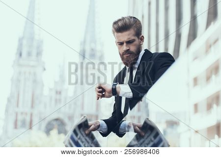 Serious Businessman Waiting Somebody Outdoor. Man Waiting Somebody. Bearded Serious Man Wearing Suit