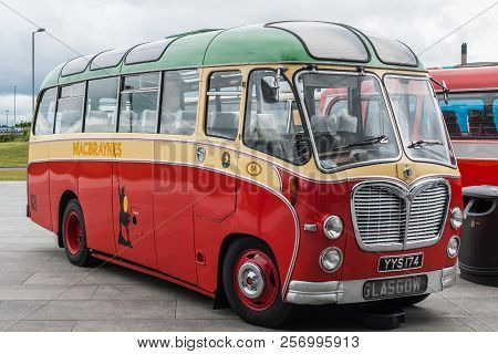 Glasgow, Scotland, Uk - June 17, 2012: Along River Clyde, Outside Riverside Museum Antique Red, Gree