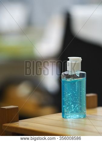 Hand Wash Gel In Plastic Bottle On Wooden Desk, Clean To Prevent Germs Protect Colona Virus, Covid 1