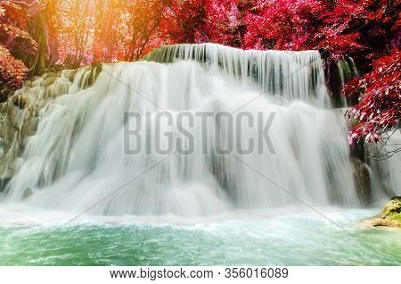 Travel To The Beautiful Waterfall In Tropical Rain Forest, Soft Water Of The Stream In The Natural P