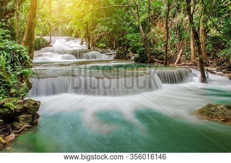 Travel To The Beautiful Waterfall In Tropical Rain Forest, Soft Water Of The Stream In The Natural P