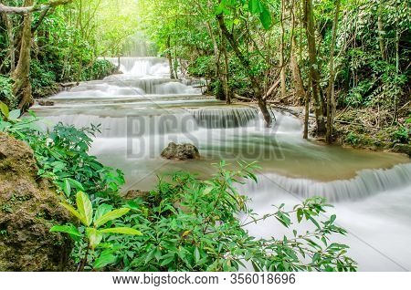 Travel To The Beautiful Waterfall In Tropical Rain Forest, Soft Water Of The Stream In The Natural P