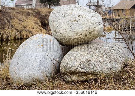 Three Large Boulders Of Large Rolled Rock Fragments. Ertil Village. Voronezh Region. Russia
