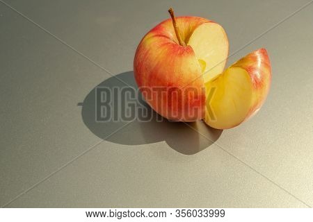 Juicy Ripe Apple Fruits On A Gray Background