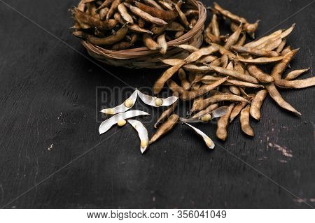 Organic Food. Soy Diet. Soybean Seeds On The Kitchen Table