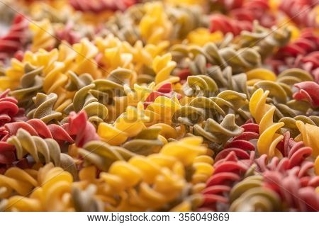 Gnocchetti Multicolored Pasta Background Concept. Diet And Healthy Food Concept