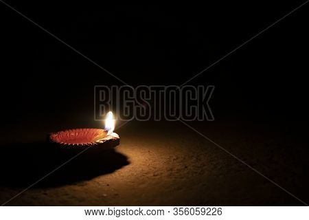 Glowing Clay Lamp In Dark Night - Happy Diwali, Light Festival, Illuminated Lights
