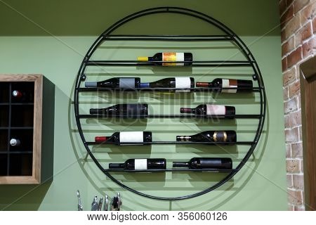 Wine Rack With Bottles Of Wine In The Interior.