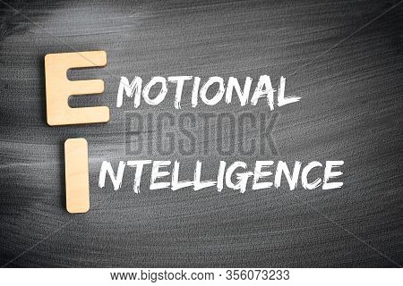Ei - Emotional Intelligence Acronym, Business Concept On Blackboard