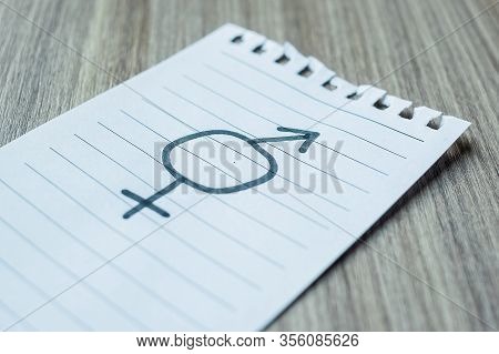 Paper Note With Gender Of Lgbtq Symbol For Lesbian, Gay, Bisexual, Transgender And Queer Community