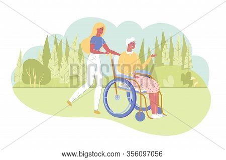 Woman Assisting Her Disabled Grandmother On Wheelchair Or Older Relative During Walk In Park. Senior