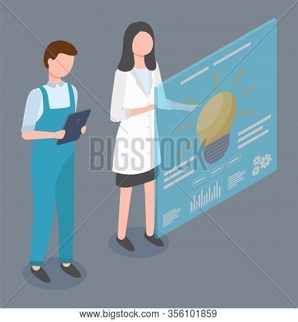 Woman And Man Stand Near Screen Or Board With Information. People Working On Factory As Engineers Or
