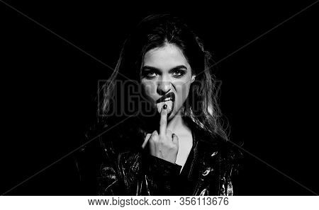 Hot Rude Girl Licking Middle Finger Gesture. Fashion Industry. Fashion Lady. Desire Concept. Wild En