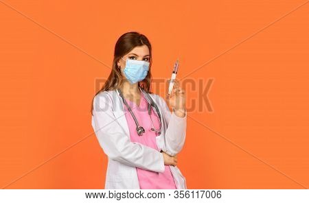 Physician Or Therapist Giving Vaccine Against Virus. Coronavirus Epidemic From China. Woman Doctor U