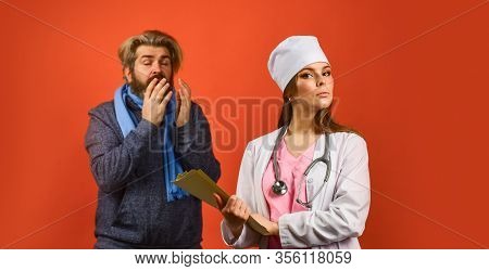 Doctor Examining Patient. First Symptoms Of Flu Or Virus. Prescribe Bed Rest. Nurse Write Out Sick L
