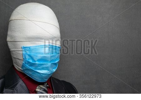 Incognito Man In A Medical Mask Is Dressed In A Business Suit