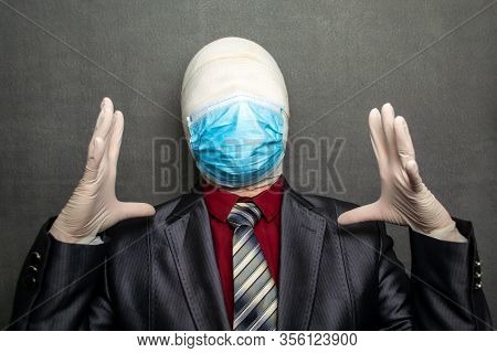 Incognito Man In A Medical Mask Is Dressed In A Business Suit
