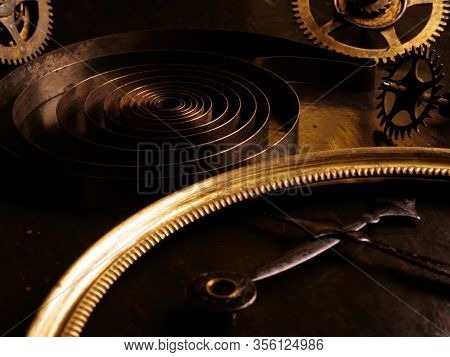 Parts Of Vintage Rare Watches, Metal Spring And Hands. Steampank Background.
