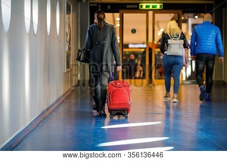 Otopeni, Romania - February 25, 2020: Passengers Inside Henri Coanda International Airport, Near Buc