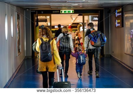 Otopeni, Romania - February 25, 2020: Passengers Inside Henri Coanda International Airport, Near Buc