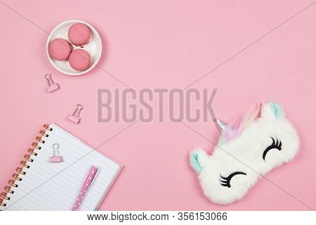 Modern Female Working Space, Top View. Cute Women's Or Girls Things, Slleep Mask, Macarons, Notepad,