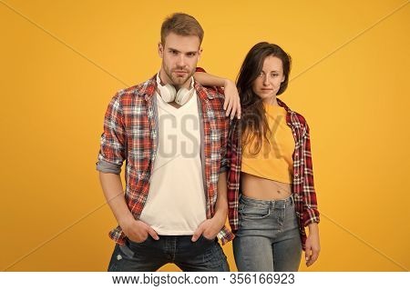 More Then Just Boyfriend And Girlfriend. Couple In Love Yellow Background. Handsome Man And Sexy Wom