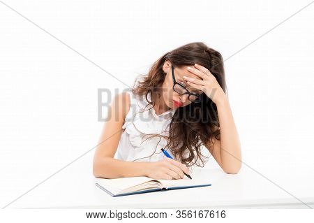 Hard Working Day. Student Busy At Work. Back To School. Concentrated On Lesson Or Exam. Woman Write 