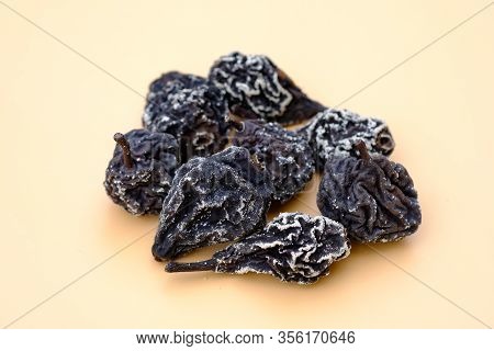 Dried Pear. Dried Smoked Black Pears. White Coating On Dry Pears. Dried Fruits For The Preparation O
