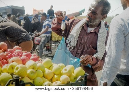 Hormozgan Province, Iran. October 27, 2016 : Local Iranian Street Fruit Vendor Using Manual Hanging 