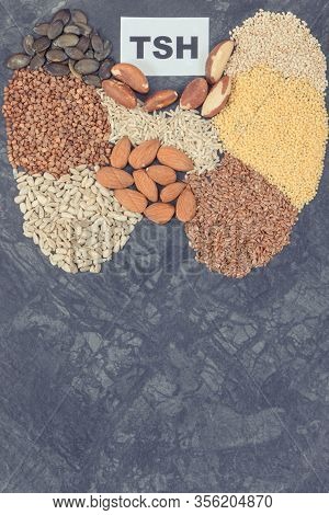 Inscription Tsh And Thyroid Shape Made Of Healthy Ingredients. Source Natural Vitamins And Minerals.