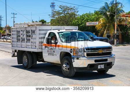 Tulum, Mexico - May 17, 2017: White Agricultural Truck Chevrolet Cheyenne In The City Street.