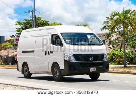 Tulum, Mexico - May 17, 2017: White Cargo Van Nissan Caravan In The City Street.