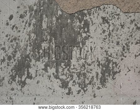 Dirty Concrete Wall With Fallen Plaster, Wall With The Cement Spatter
