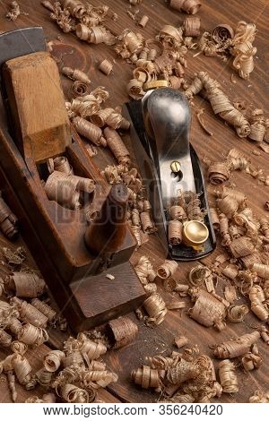 Chisel And Small Block Plane With Wood Shavings