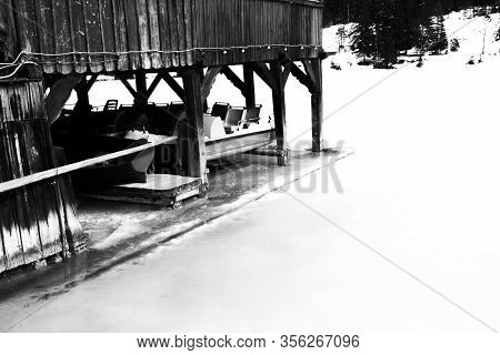 Pedal Boats Rest Under The Stilt House Of A Restaurant On The Banks Of The Frozen Lake Of Dobbiaco I