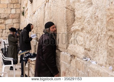 Jerusalem, Israel, March 3, 2020 : Blissful Believer Orthodox Jew Prays Near The Kotel In The Old To