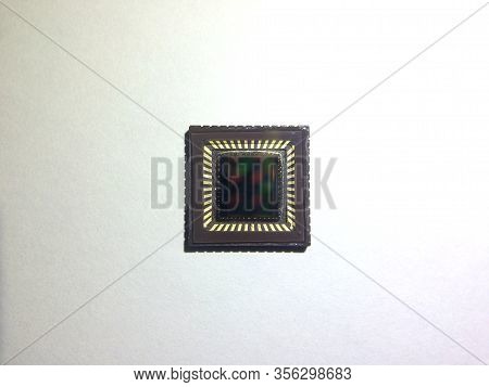 A Ccd Image Sensor Or A Cmos Image Sensor On White Background.