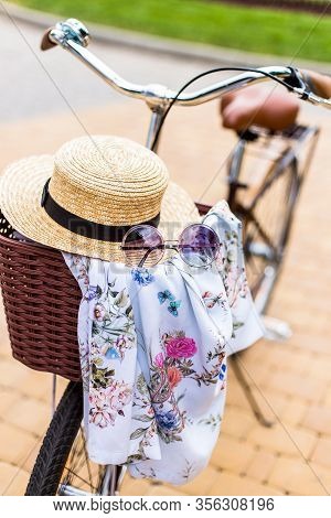 Walking Bike With Basket And Dress Inside And No Name  Sunglasses