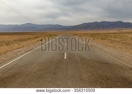 Asphalt Road To The Akyrtas Palace Complex In The Jambyl Region Of Kazakhstan.
