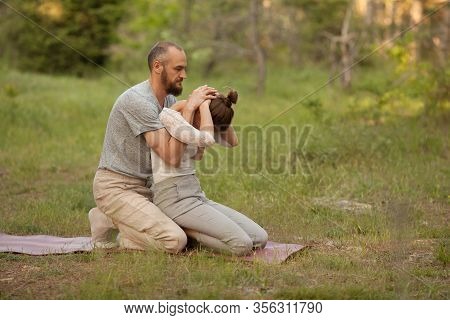 Yumeiho Massage Therapy. Masseur Young Man Doing Oriental Japanese Massage Yumeiho Girl. Concept Of 