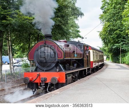 Lakeside, England - August 8:  Victor, A Preserved Steam Locomotive, Departs Lakeside Station On Aug