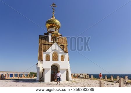 Tarkhankut, Crimea, Russia-september 11, 2019: People Near The Church-chapel Of St. Nicholas, The Pa