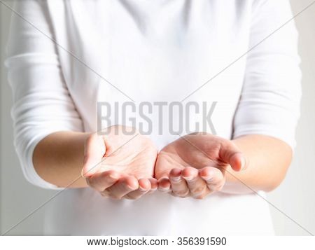 Close-up Of A Woman Open Palms Of Two Hands For Prop Up For Something; Or Beg For Something. Selecti