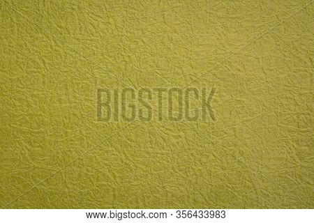 moss green Japanese Momi Washi paper background featuring a rough, evenly textured surface formed by crinkling the paper during the manufacturing process